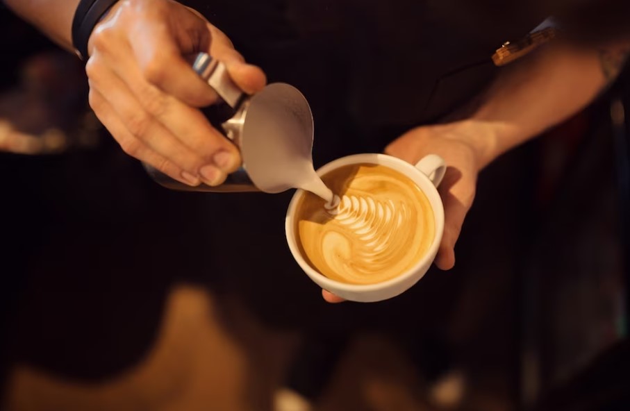 i'm showing how to make a flat white coffee with beautiful latte art
